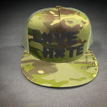 Load image into Gallery viewer, Camo LXVE over HXTE Trucker Hat
